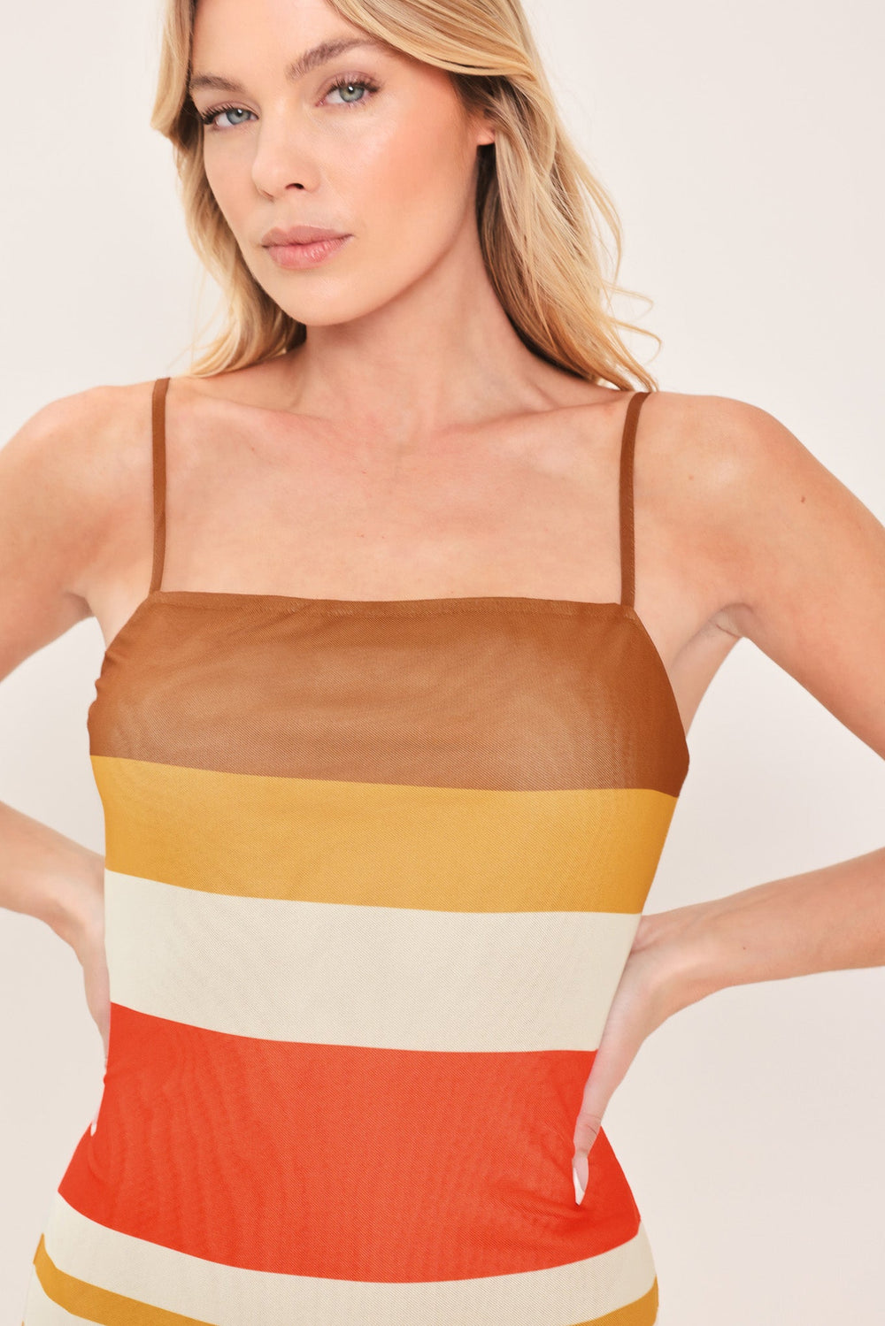 Heat Waves Power Mesh Midi Dress from KADOU Boutique