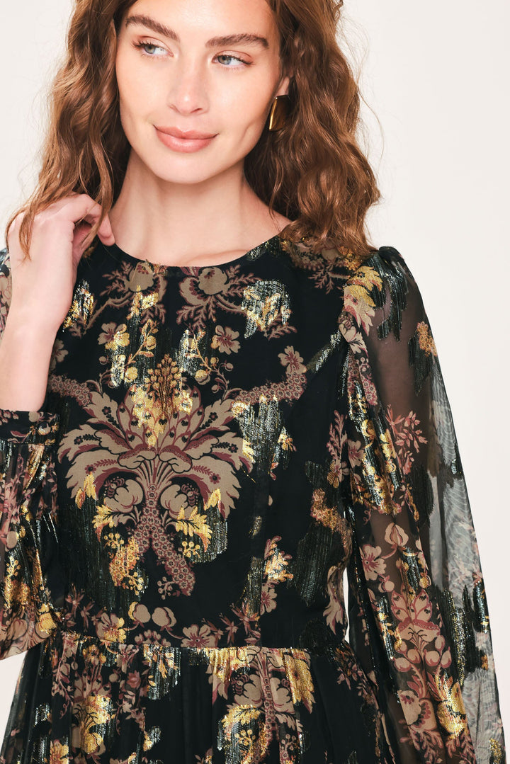 Midnight Flirt Black Printed Ruffle-Hem Mini Dress from KADOU Boutique