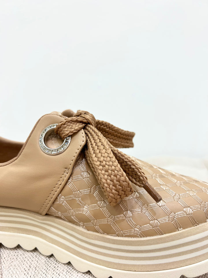 A closer look at the Fine Threads Embroidered Sneakers.
