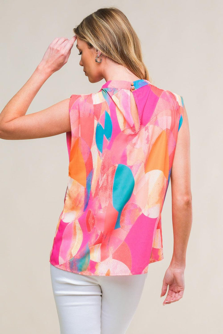 Printed woven sleeveless top with high neckline