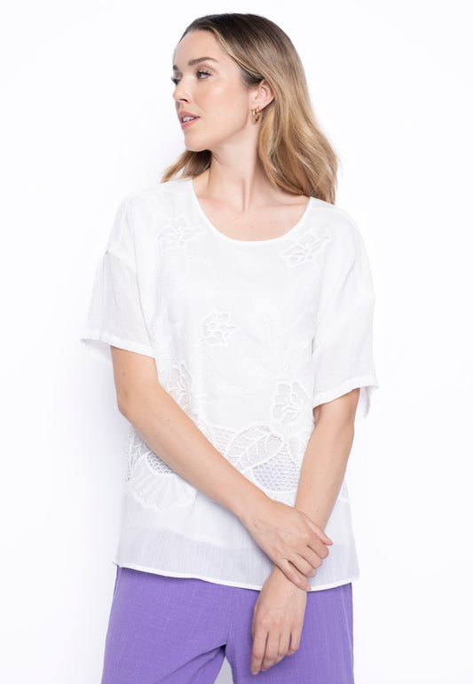 The Embroidered Flowy Blouse in white color. Available online or in store at Kadou Boutique.