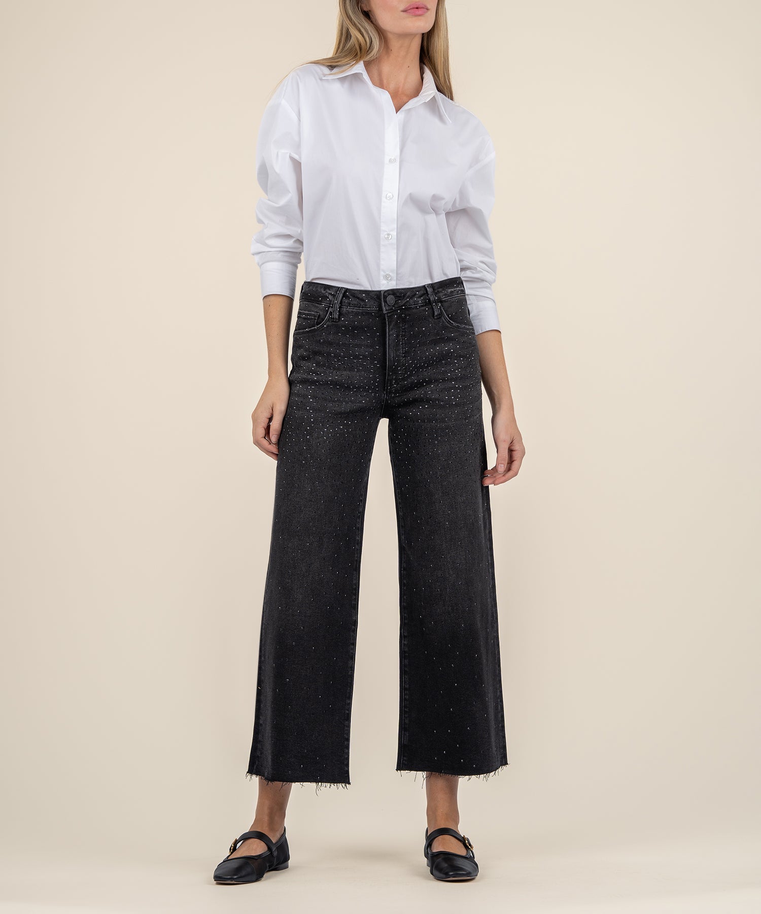 Illuminated Wide Leg Raw Hem Denim Pants, available at Kadou Boutique. Shop online and enjoy free shipping for orders $75 or more.