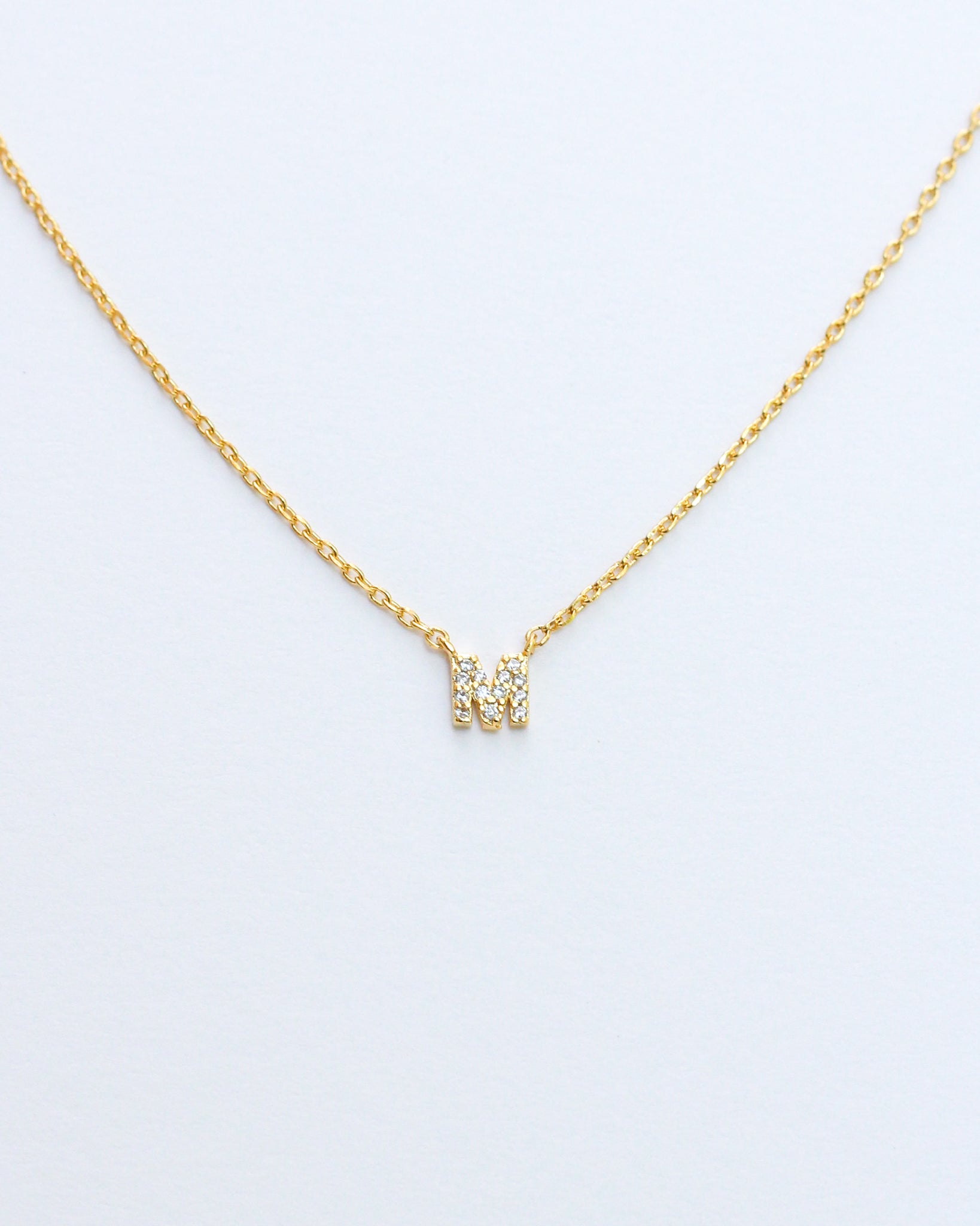 Mini Pave Initial Necklace - Letter M.