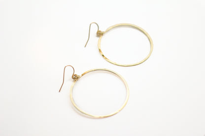 Hammered Medium Circle Earrings. 14K gold plated. At Kadou Boutique.