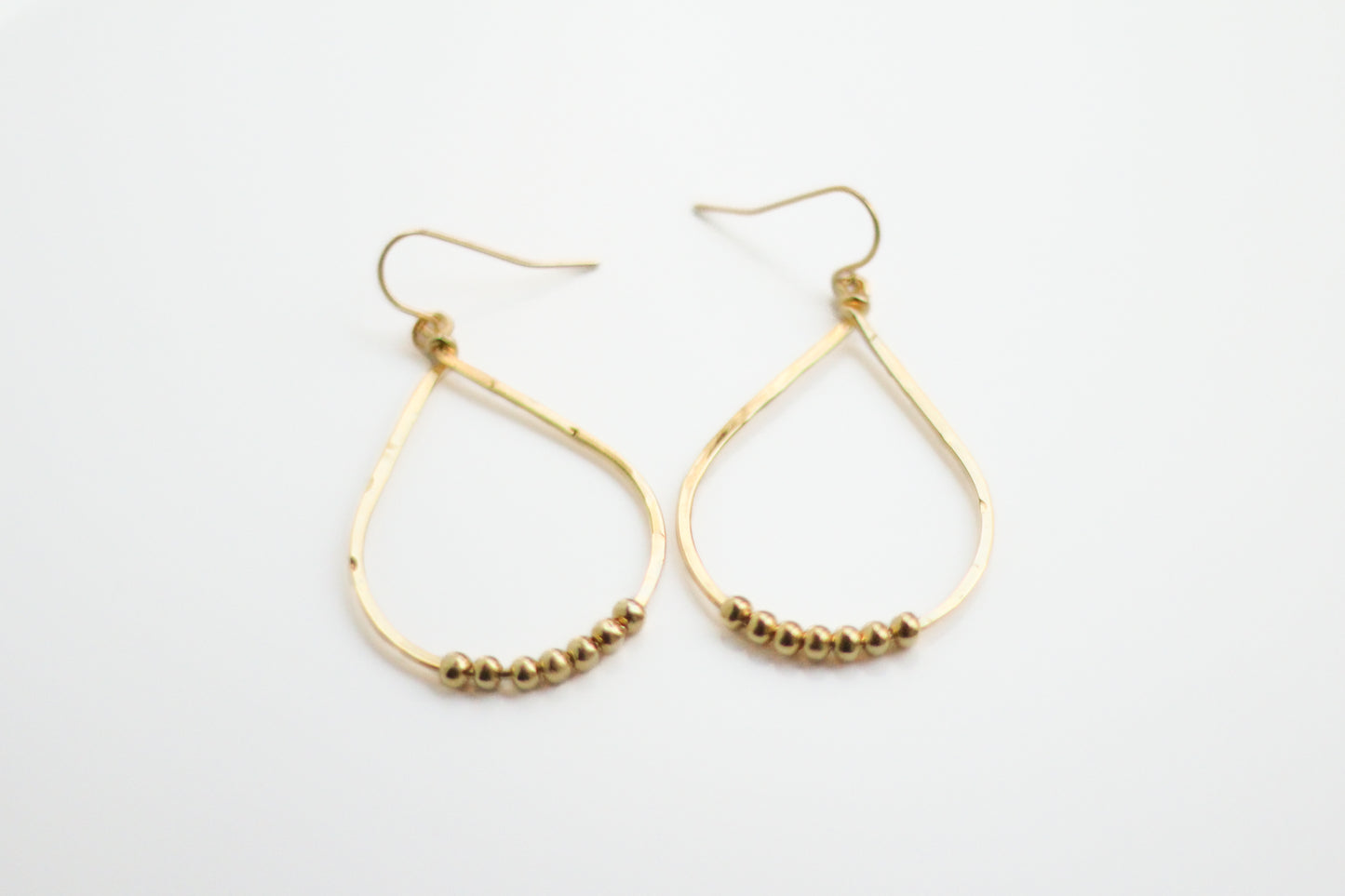 Hammered Teardrop Beads Earrings. 14K Gold plated.