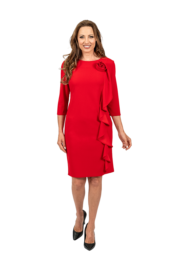 Woman wearing a red dress with a draped effect on a white background