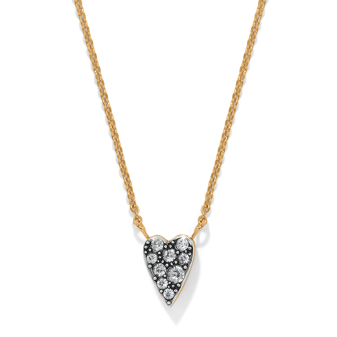 Heart-shaped pendant necklace with diamonds on a gold chain against a white background