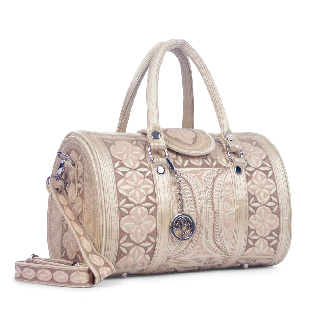 Nano Handbag - Mutiara in Beige color, side view. Available at Kadou Boutique.