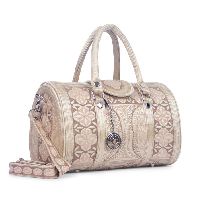 Nano Handbag - Mutiara in Beige color, side view. Available at Kadou Boutique.