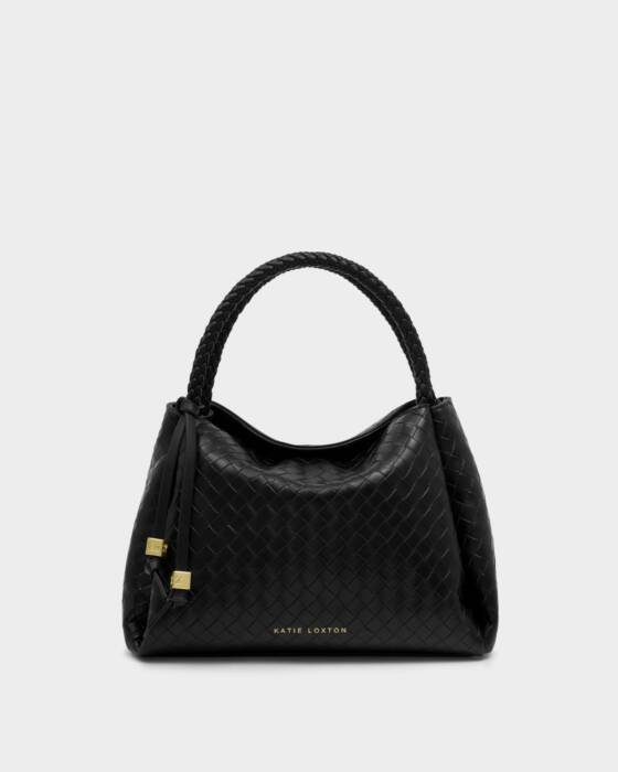 Black handbag with gold accents on a light gray background