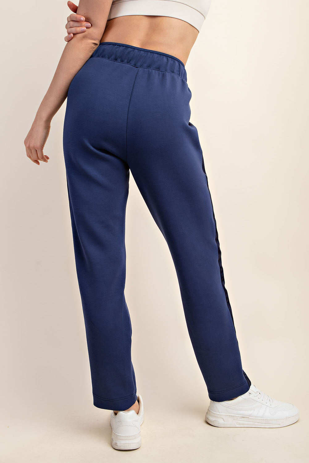 The Modal Jogger with Satin Side Detail in Smokey Navy color. Back view.