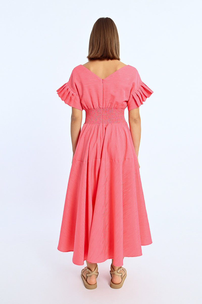 A back view of the Pretty In Pink Maxi Dress, available at Kadou Boutique.