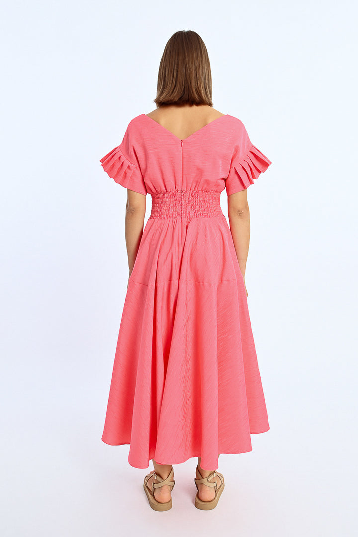 A back view of the Pretty In Pink Maxi Dress, available at Kadou Boutique.