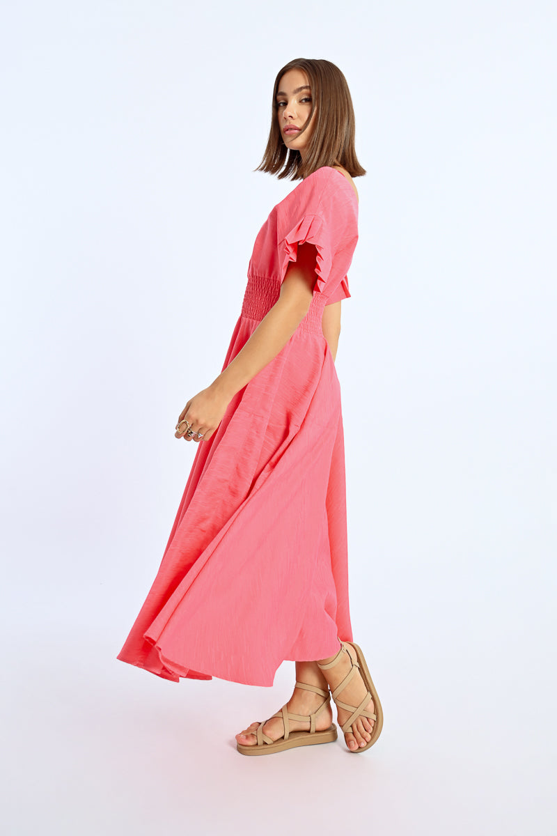 A side view of the Pretty In Pink Maxi Dress 