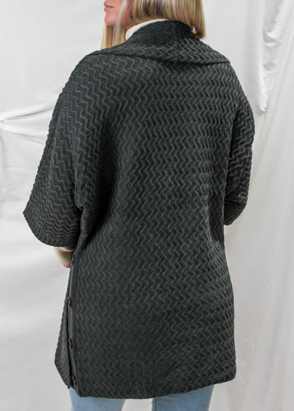 The Knit Cardigan in Grey, a back view.