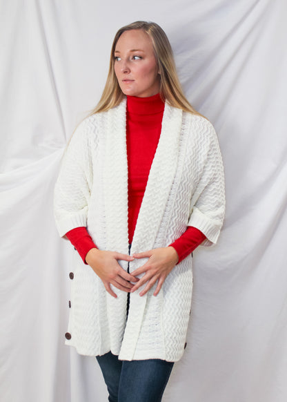 The Knit Cardigan in Ivory color.