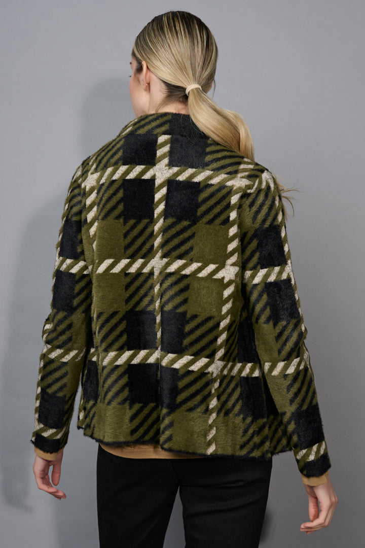 A back view of a person wearing a plaid jacket with green, black, and beige pattern on a gray background