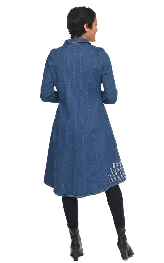 A back view of a woman wearing a blue denim dress with a white background