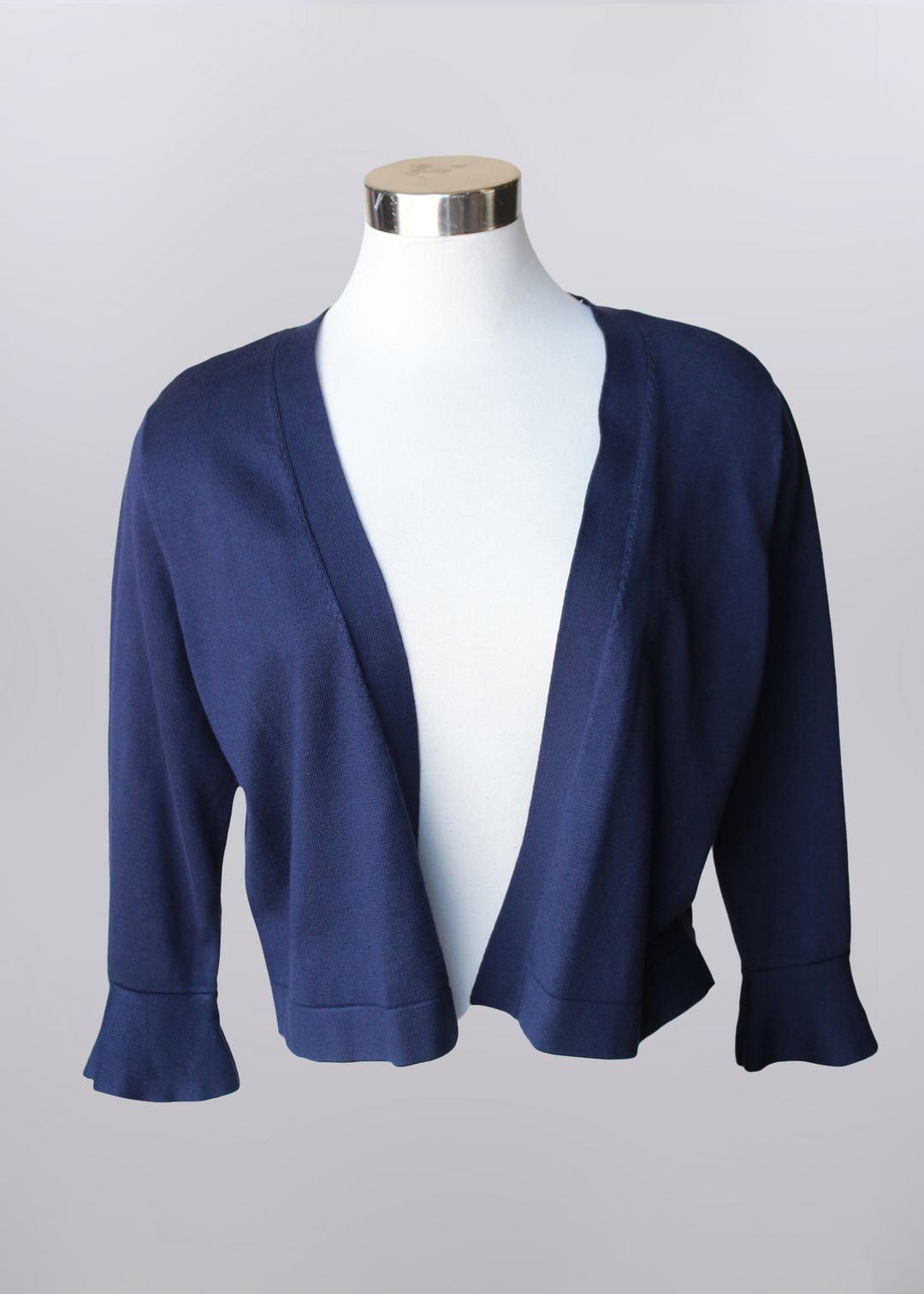 Ruffled Sleeve Knit Bolero in Navy color.