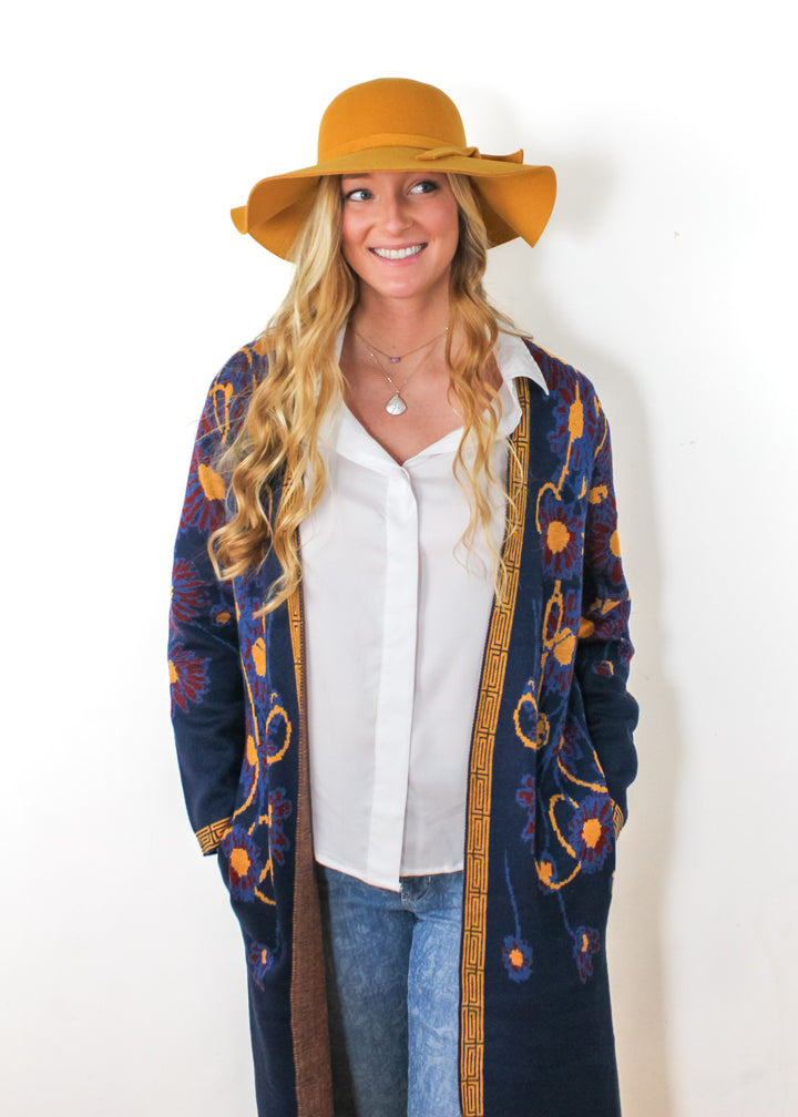 The Multi Color Festive Cardigan from Kadou Boutique.