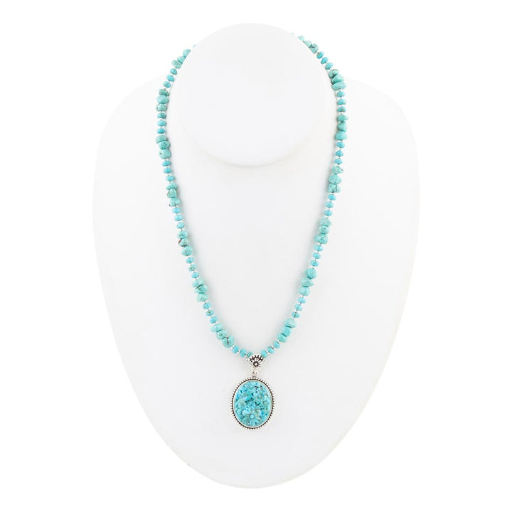 Carved Blue Turquoise and Sterling Silver Pendant
