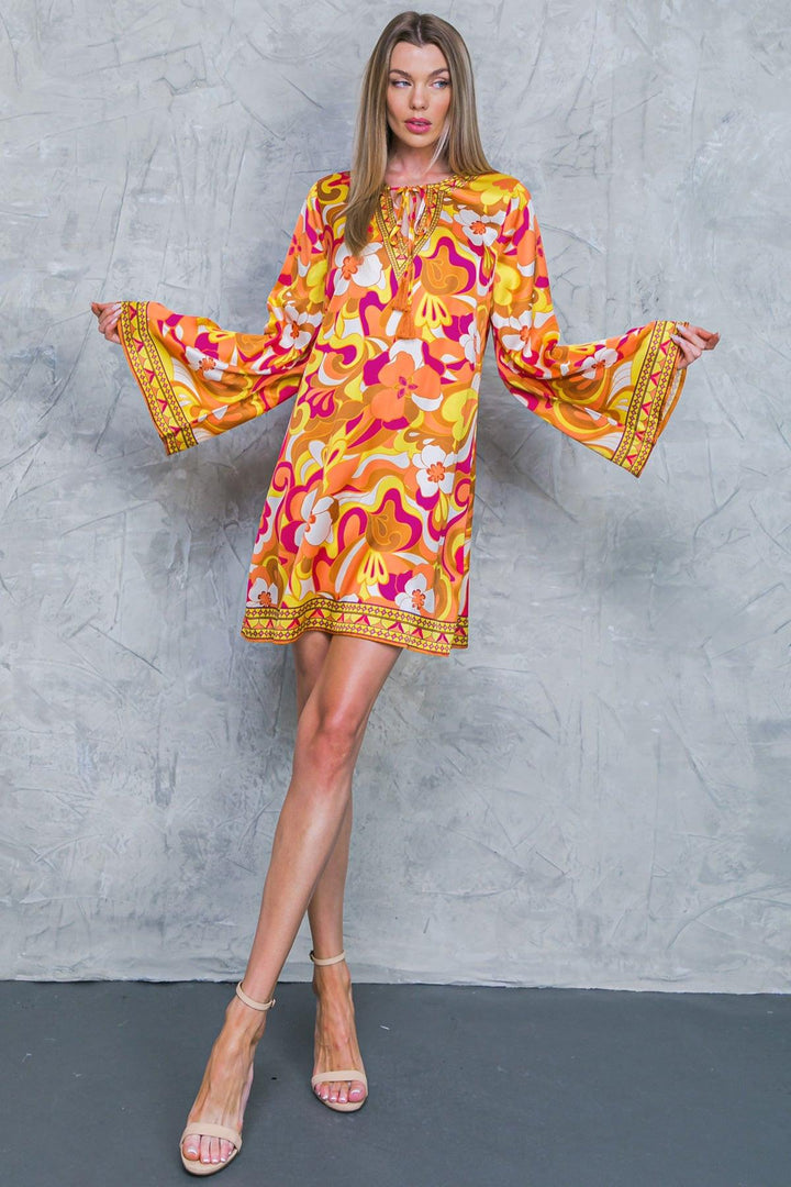 Caught Feelings Woven Mini Dress from KADOU Boutique