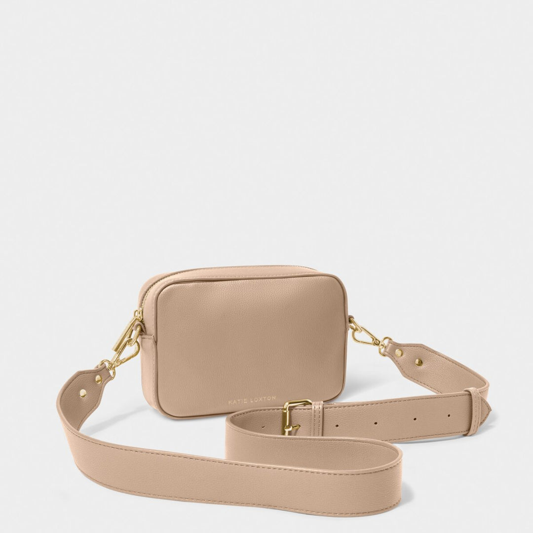 Zana Mini Crossbody Bag in Soft Tan with its crossbody adjustable strap.