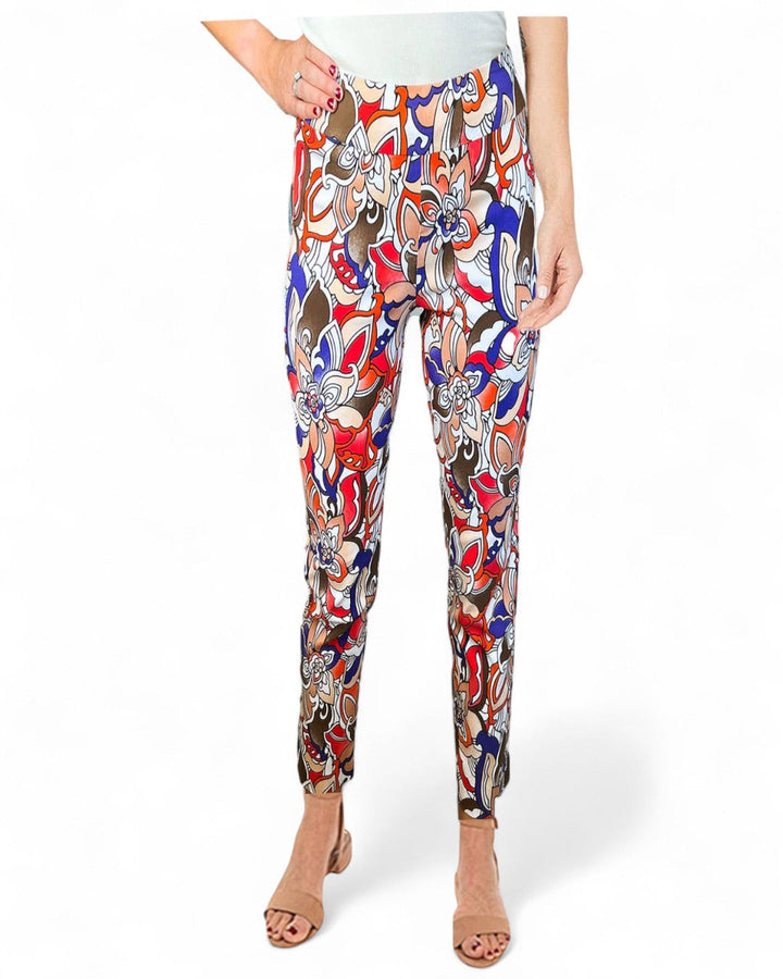 Colorful patterned pants worn by a person on a white background