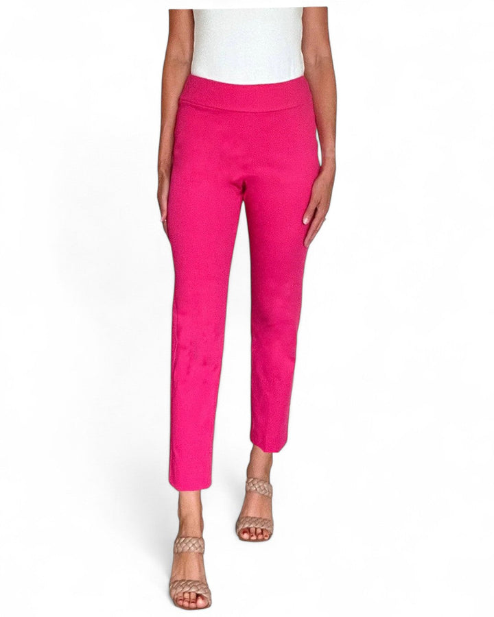 Person wearing bright pink pants on a white background