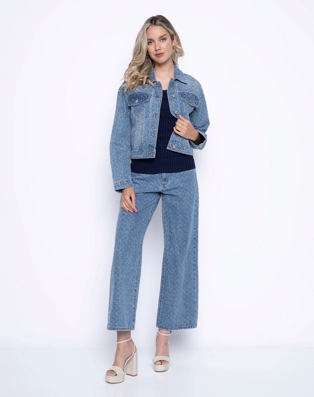 Front look of the light denim wide leg jeans.