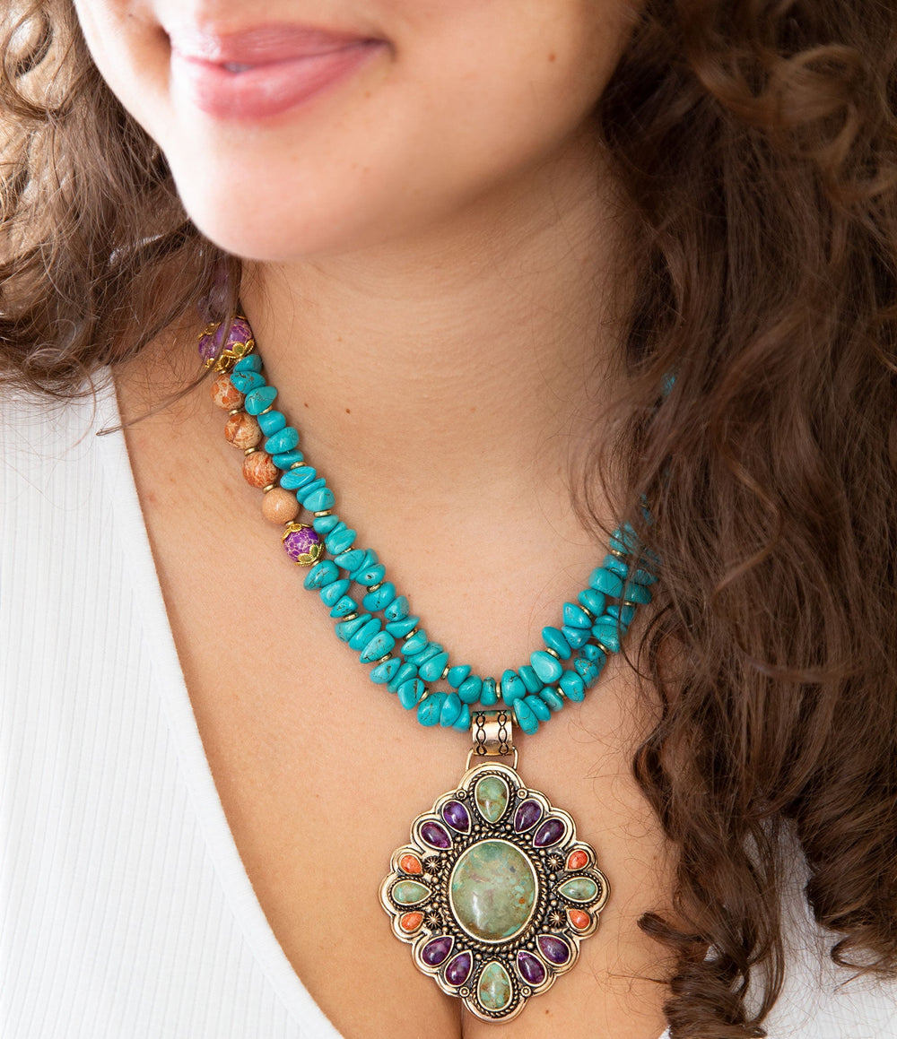 Prescott Blue Turquoise Purple and Orange Statement Pendant Golden Necklace from KADOU Boutique