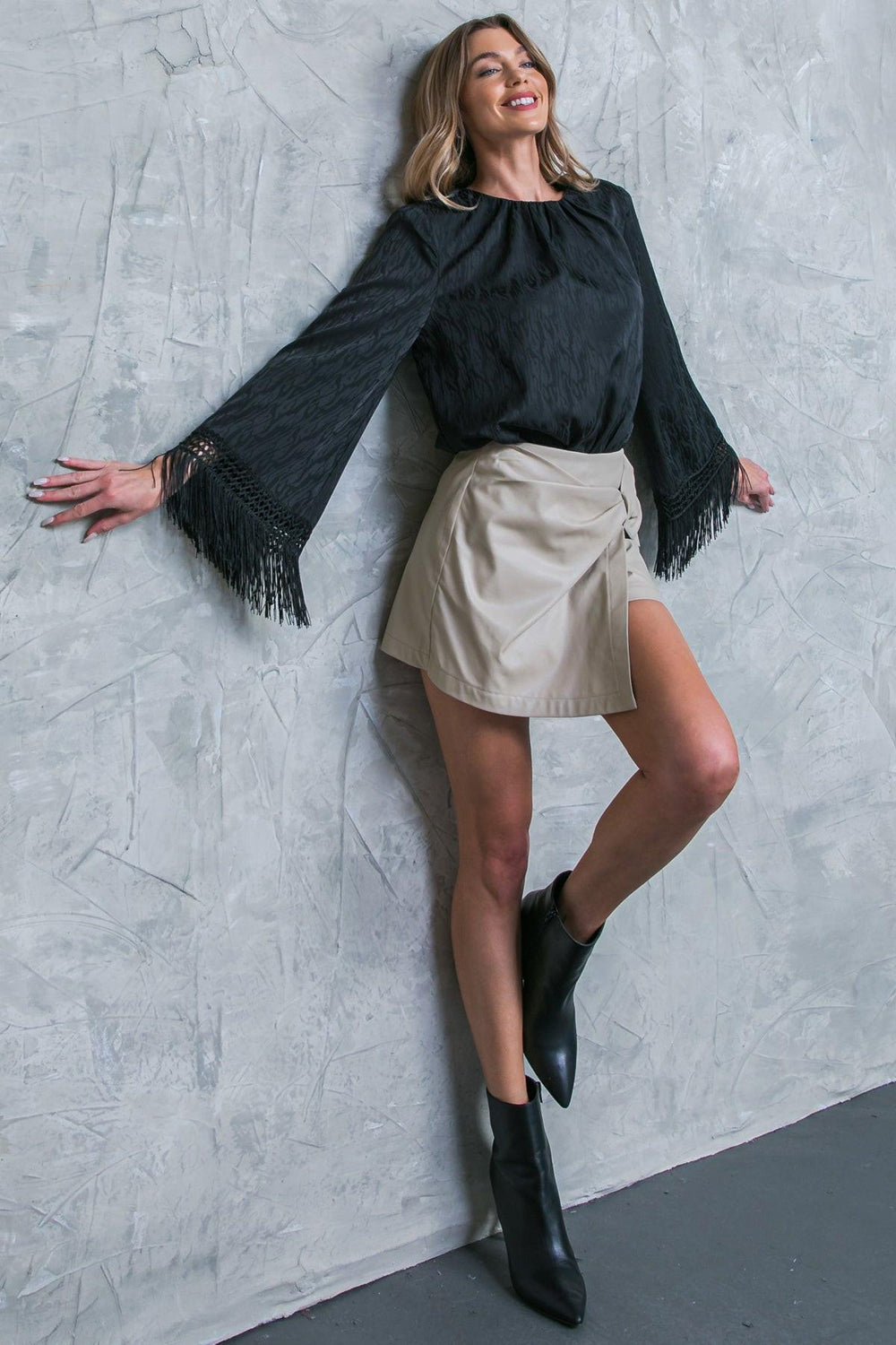 A Step Ahead Faux Leather Skort from KADOU Boutique