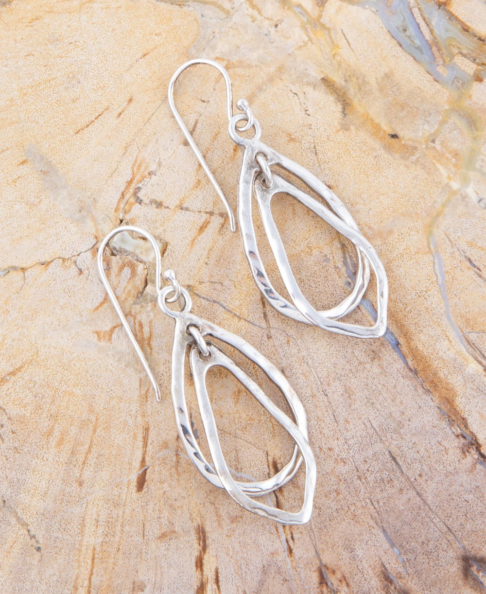 Swirled Sterling Silver Drop Earrings from KADOU Boutique