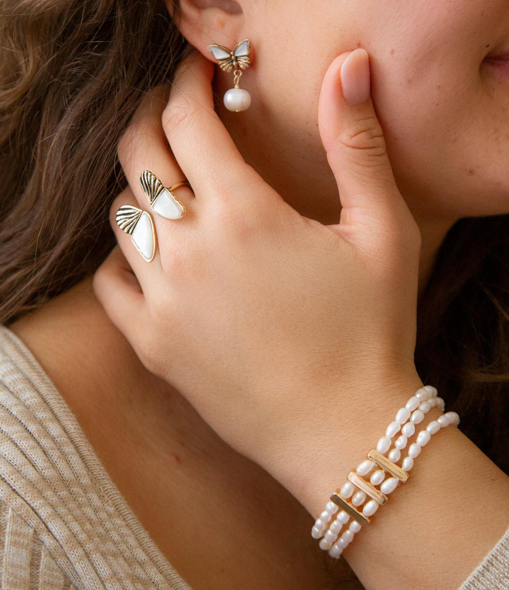 White Mother of Pearl Golden Butterfly Statement Ring from KADOU Boutique