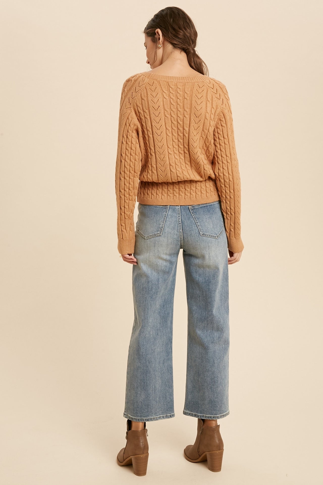 Cable Knit Drawstring Long Sleeve Sweater in Camel color. Back view.