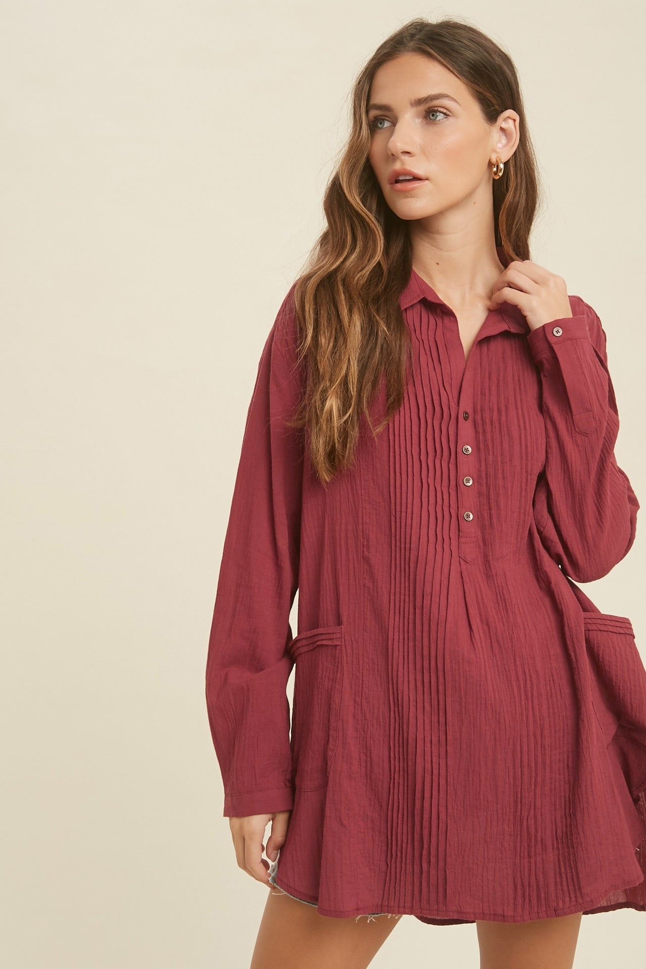 Showing a model wearing the Button Down Tunic Top in sienna color.