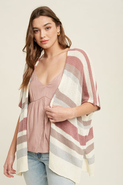 Stripe Dolman Short Sleeve Cardigan in the ivory combo color. The model is wearing a light pink v-neck top underneath.
