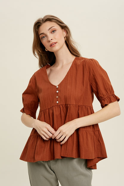 Babydoll Woven Top in Brick color.