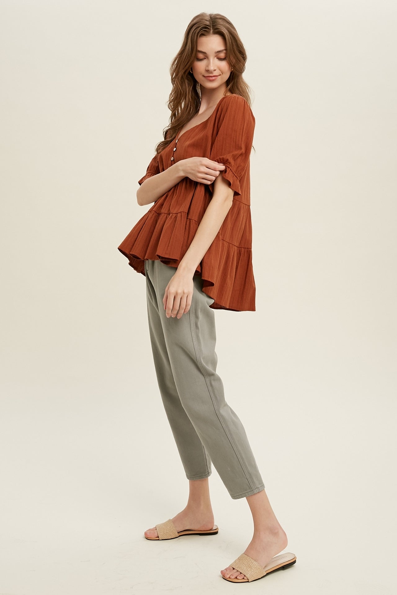 Babydoll Woven Top in Brick color.