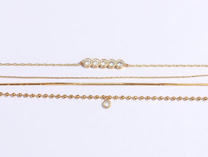 Bracelet Set Cubic Zirconia.  Have fun with this dainty 3-chain bracelet set to complete your look.  You could wear one, two or all of them together and you could layer them with your watch or any piece of jewelry of your choice.