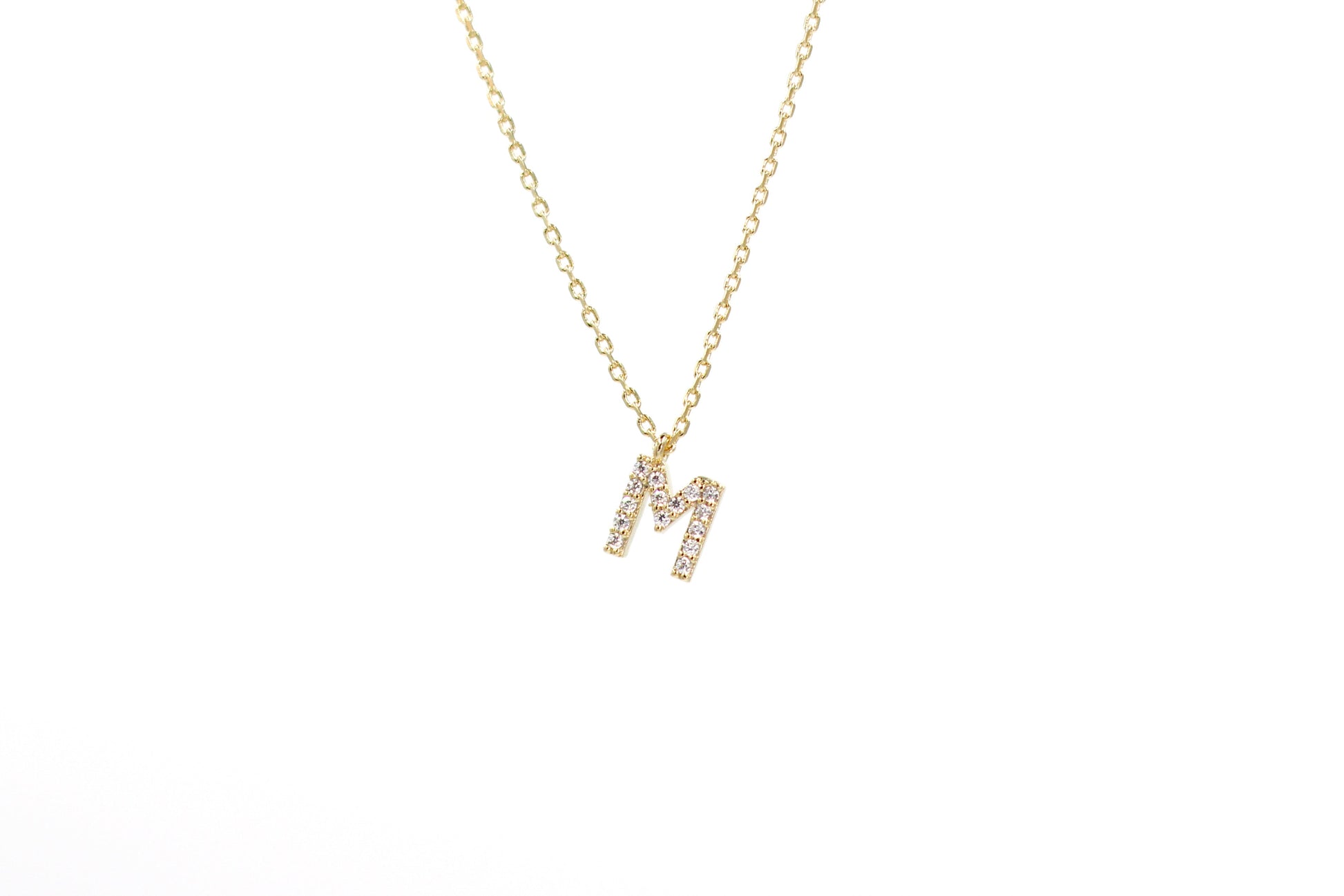 Letter M necklace.