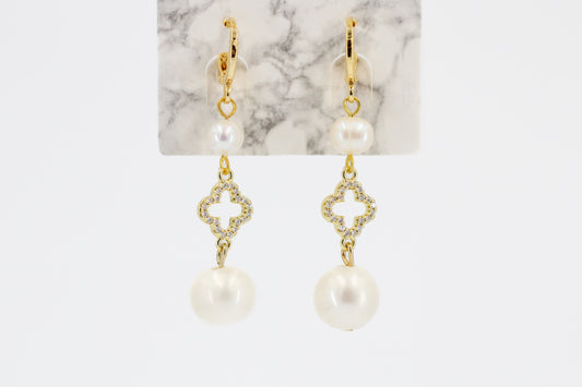 Double Pearl Open Clover Drop Earrings from Kadou Boutique.