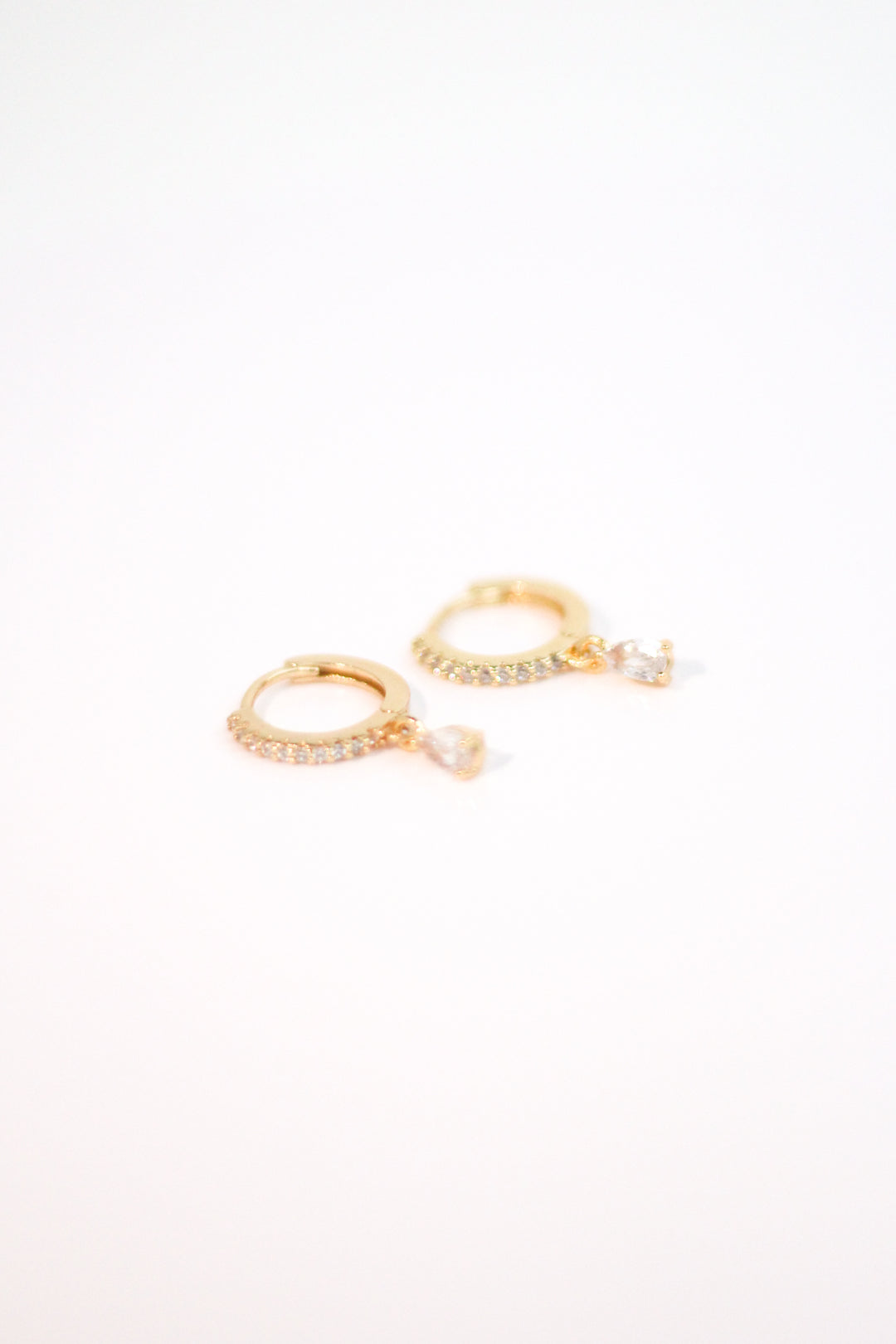 Teardrop Dangle Earrings. Cubic zirconia Pave and teardrop dangle. from KADOU Boutique. 
