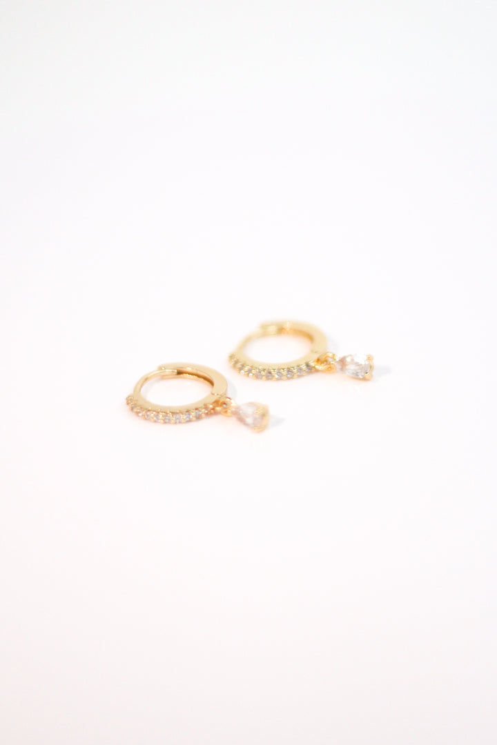 Teardrop Dangle Earrings. Cubic zirconia Pave and teardrop dangle. from KADOU Boutique. 