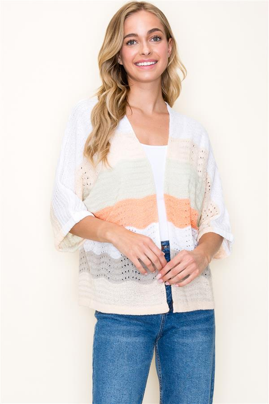 Picture is showing a model wearing the Lightweight Open Front Cardigan from Kadou Boutique. Free shipping. 
